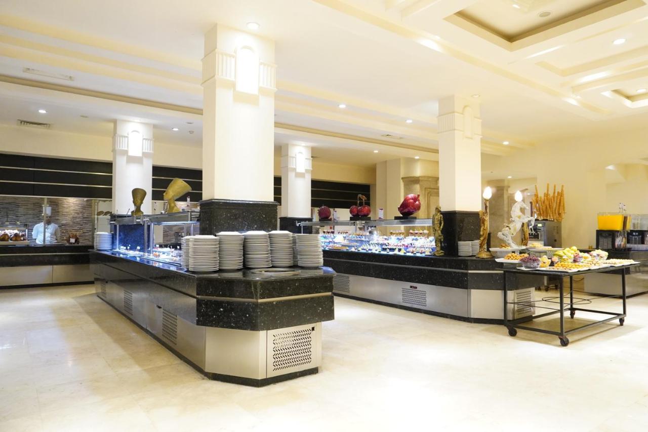沙姆沙伊赫 Charmillion Club Aquapark酒店 外观 照片 A buffet at a hotel
