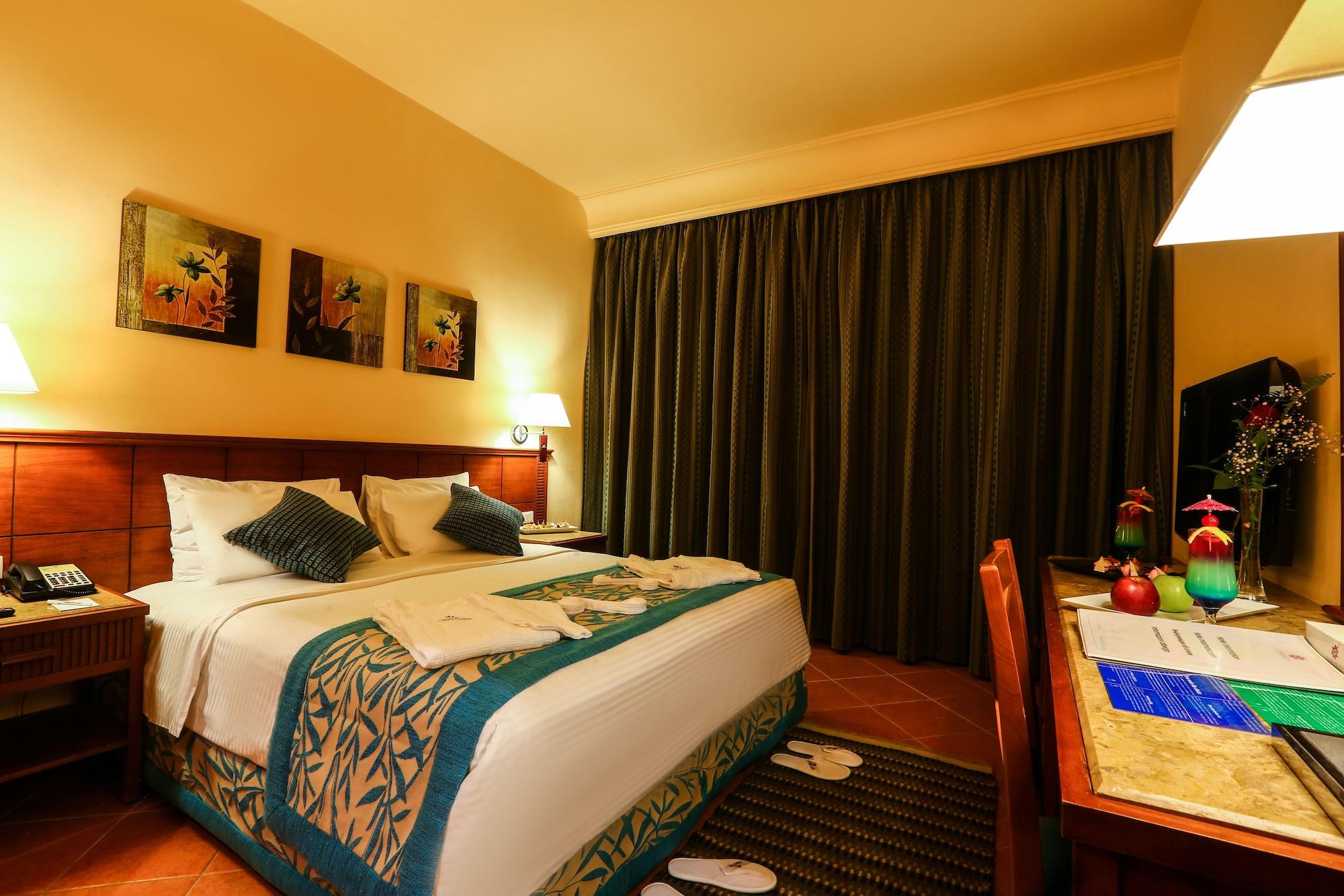 沙姆沙伊赫 Charmillion Club Aquapark酒店 外观 照片 A bedroom at the hotel